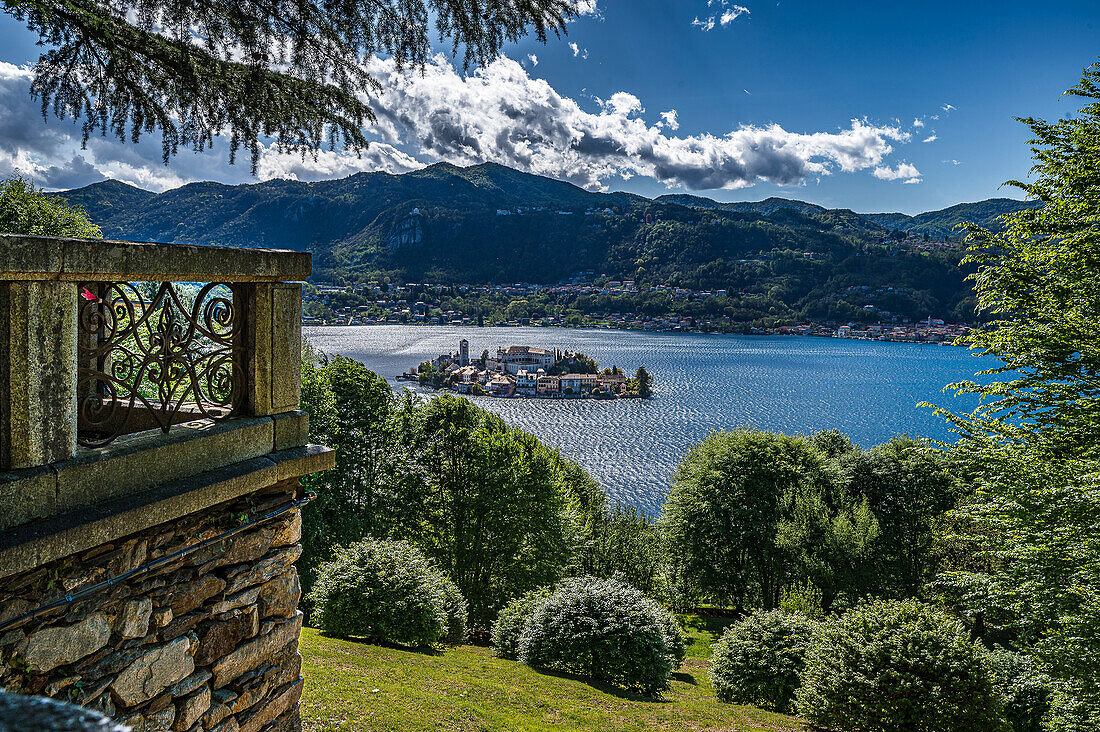  View of Isola San Giulio from the Sacro Monte d&#39;Orta pilgrimage site World Heritage Site, Lake Orta is a northern Italian lake in the northern Italian, Lago d&#39;Orta, or Cusio, region of Piedmont, Italy, Europe 