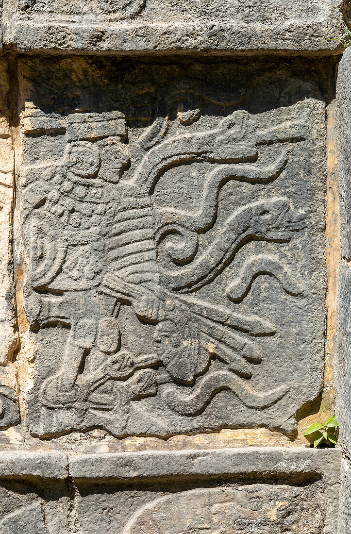 Carved stonework figure, Platform of Skulls, Tzompantli, Chichen Itzá, Mayan ruins, Yucatan, Mexico