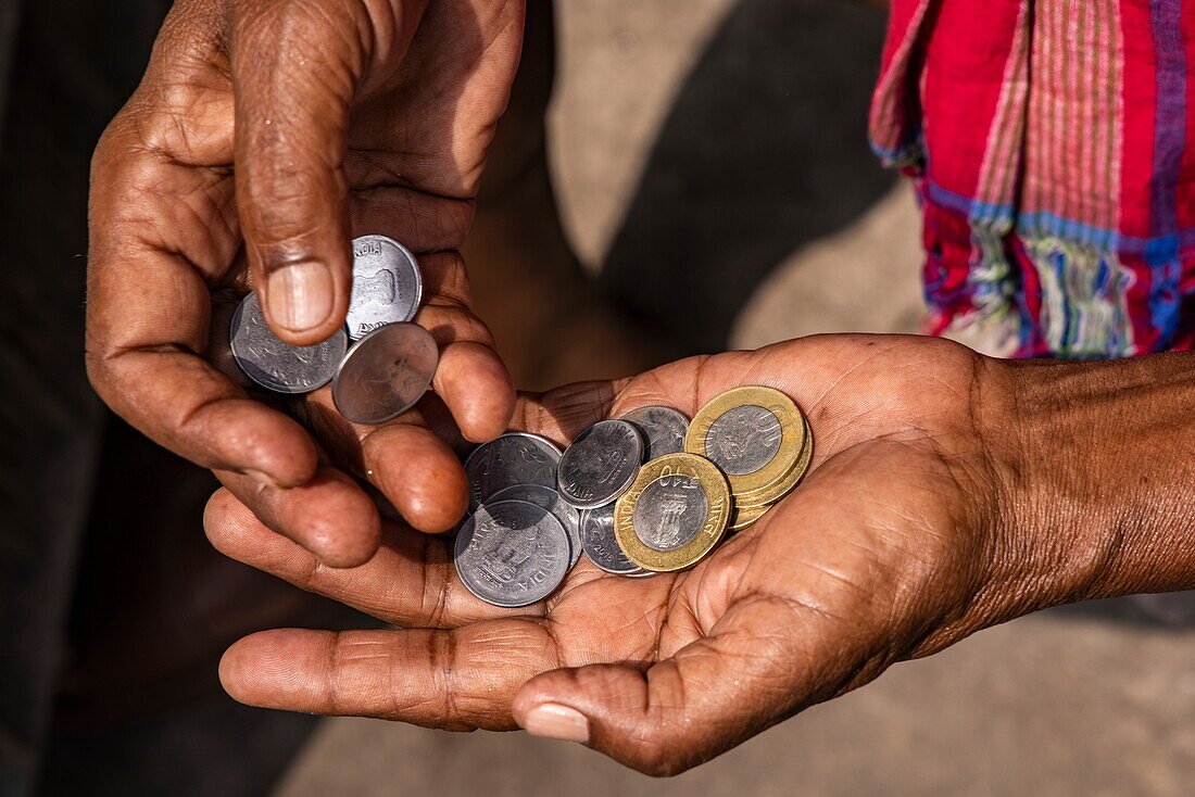  Close-up of Bangladeshi Taka and Poisha coins in the hands of a man, Kolkata, Calcutta, India, Asia 