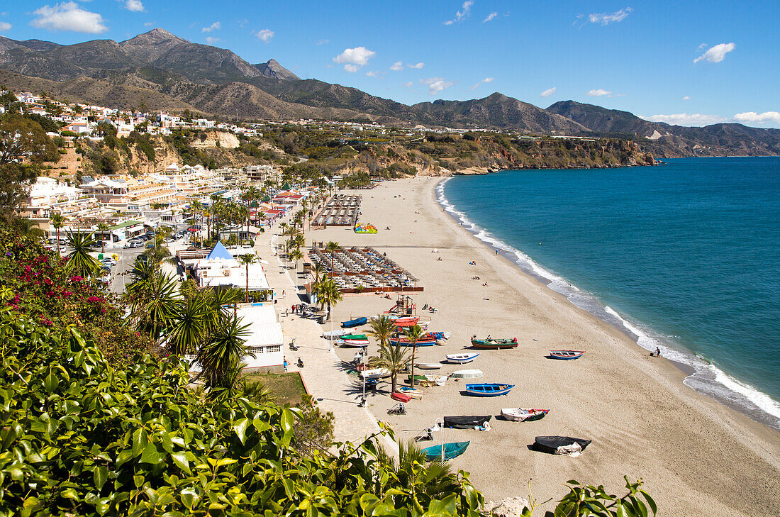 Playa Burriana sandy beach at popular holiday resort town of Nerja, Malaga province, Spain