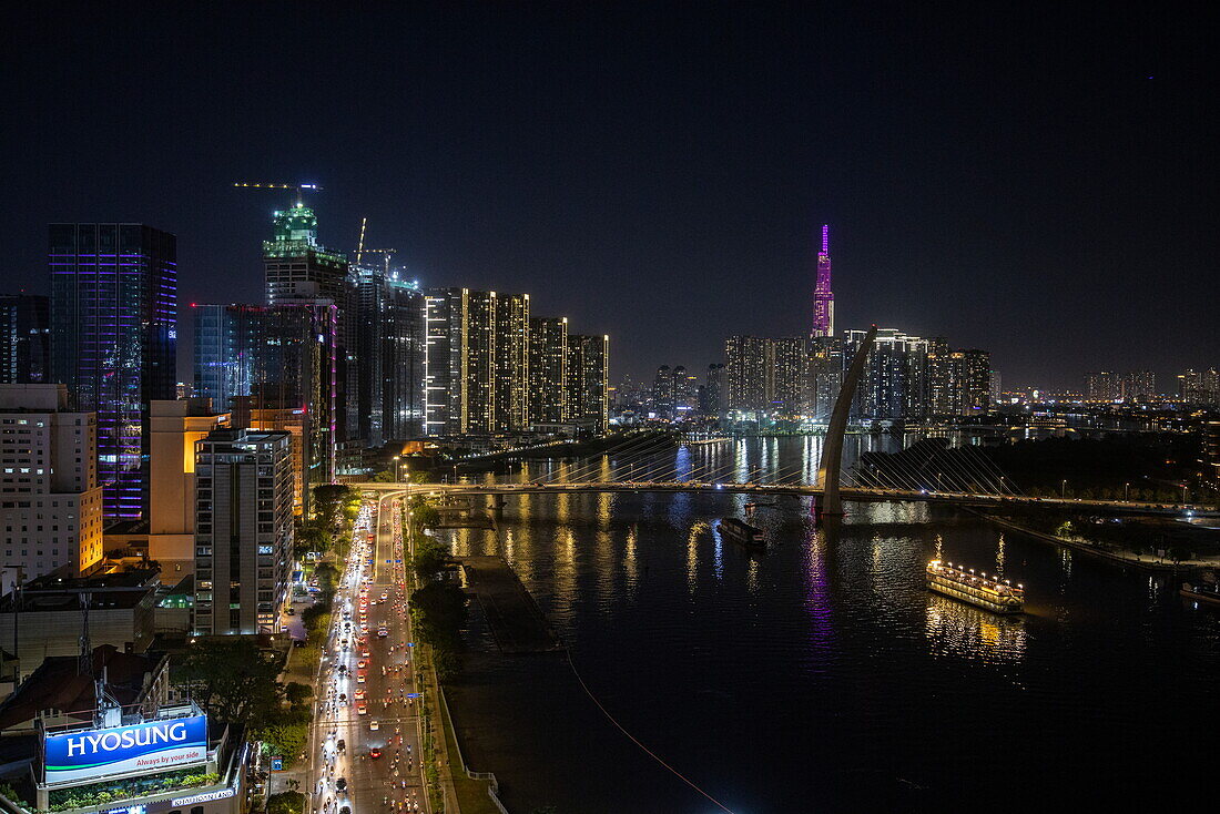  Skyline view from the Liquid Sky Bar of the Renaissance Riverside Hotel Saigon at night, Ho Chi Minh City (Saigon), Vietnam, Asia 