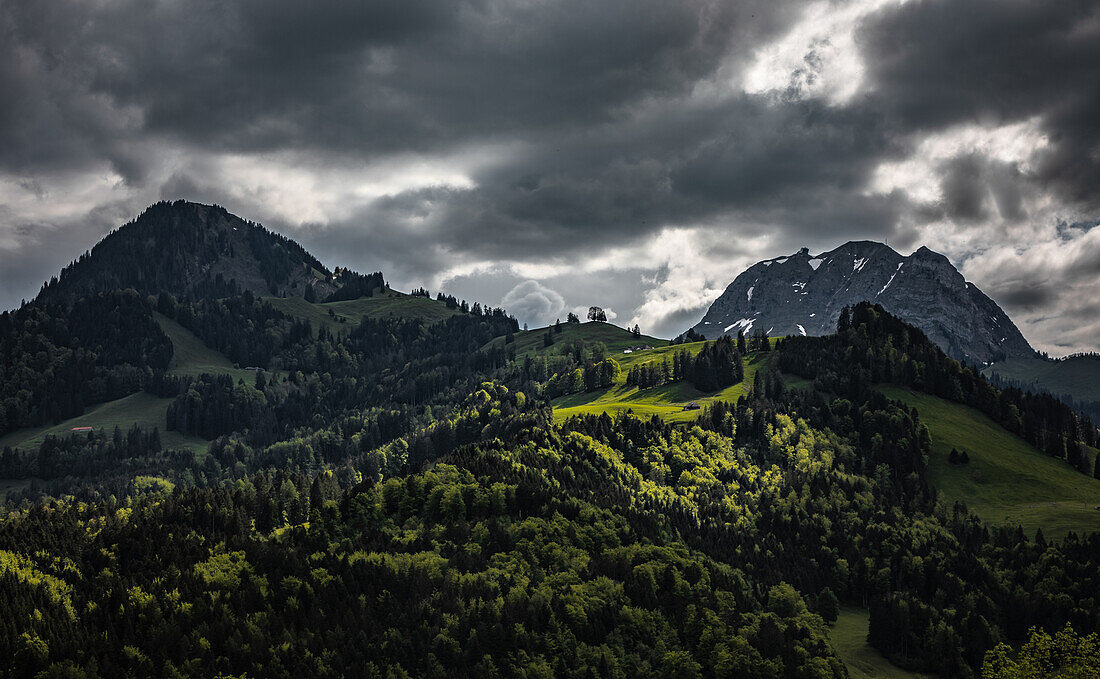  View of the Swiss Alps from the small village of Gruyeres in the canton of Fribourg, Switzerland 