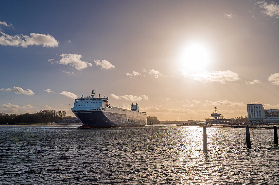  View of a cargo ship leaving Travemuende, Baltic Sea, Ostholstein, Schleswig-Holstein 