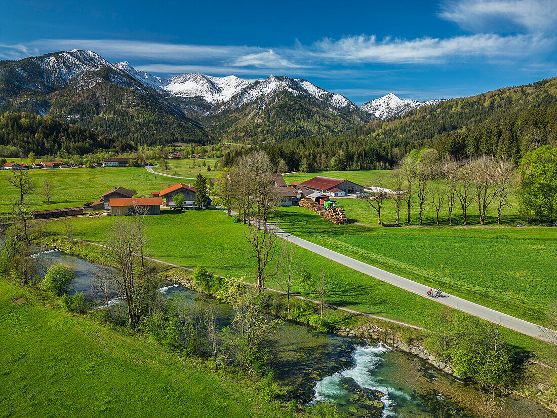  Aerial view with man and woman cycling on the Lake Constance-Königssee cycle path through the Leitzachtal, Fischbachau, Leitzachtal, Upper Bavaria, Bavaria, Germany 