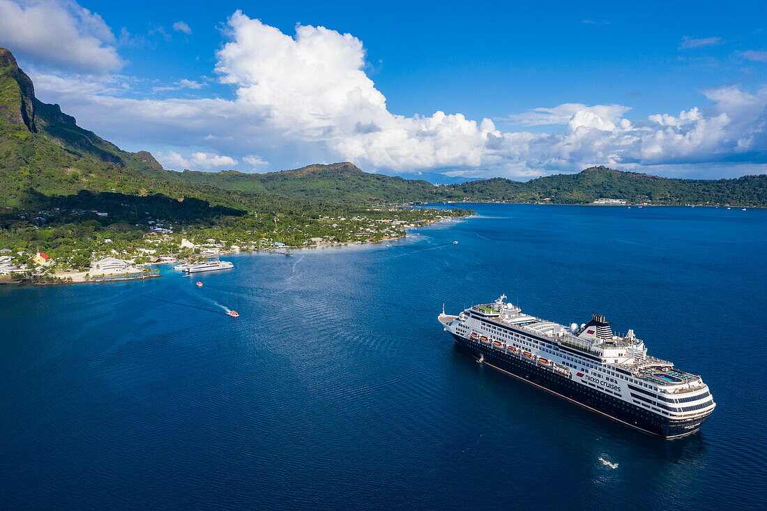  Aerial view of the cruise ship Vasco da Gama (nicko cruises) in the lagoon of Bora Bora with the town of Vaitape and Mount Otemanu, Bora Bora, Leeward Islands, French Polynesia, South Pacific 