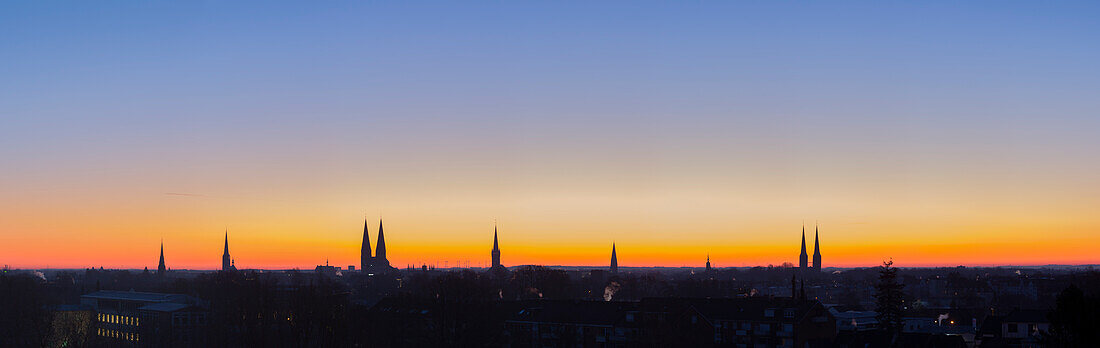  View of the old town and churches of Luebeck at sunrise, Hanseatic City of Luebeck, Schleswig-Holstein, Germany 