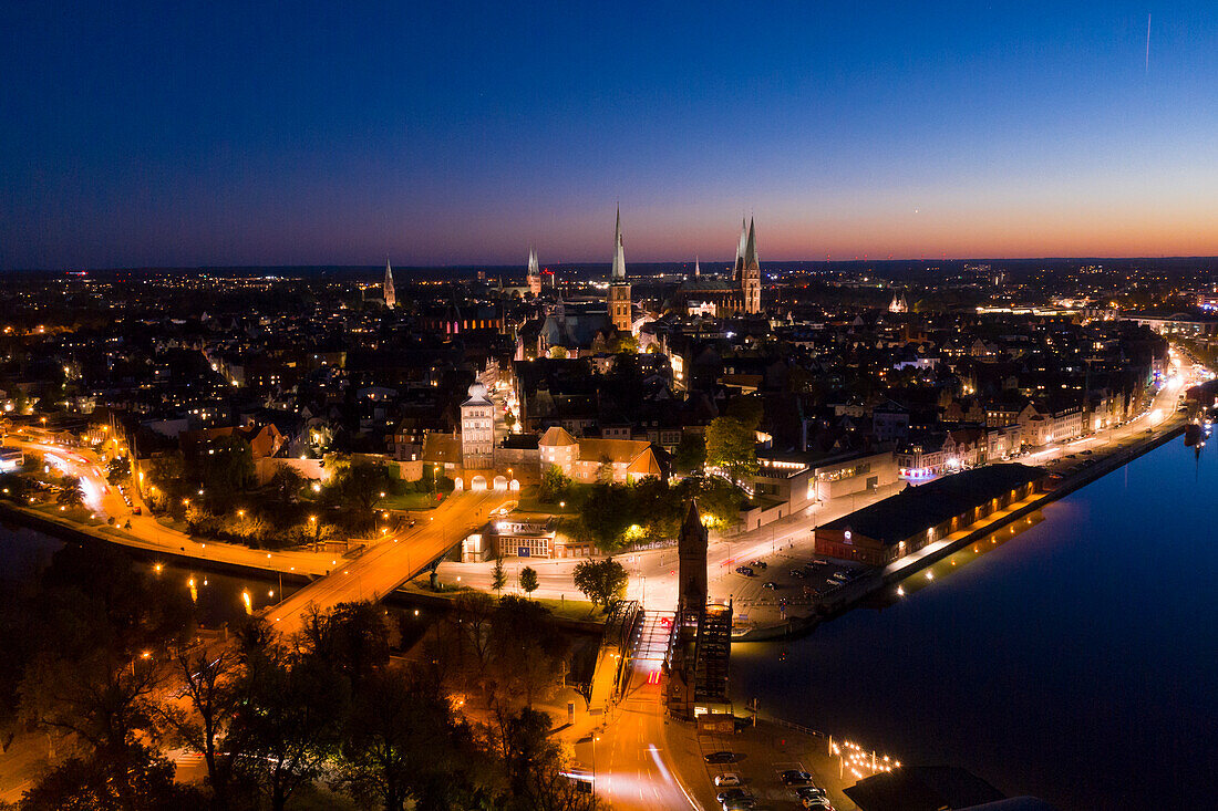  Evening view of the old town and the castle gate, Hanseatic City of Luebeck, Schleswig-Holstein, Germany 