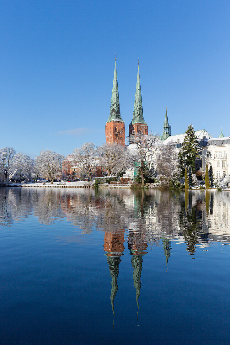  Cathedral church with reflection, winter, Hanseatic City of Luebeck, Schleswig-Holstein, Germany 