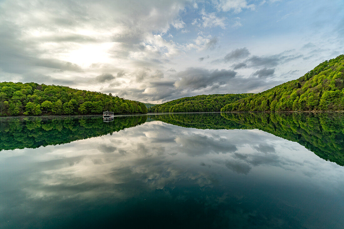  Electric tourist boat on the largest lake Kozjak in Plitvice Lakes National Park, Croatia, Europe  