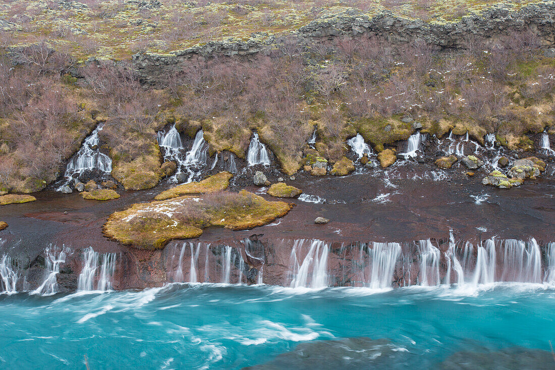  Hraunfossar are waterfalls of the river Hvíta, Winter, Vesturland, Iceland 