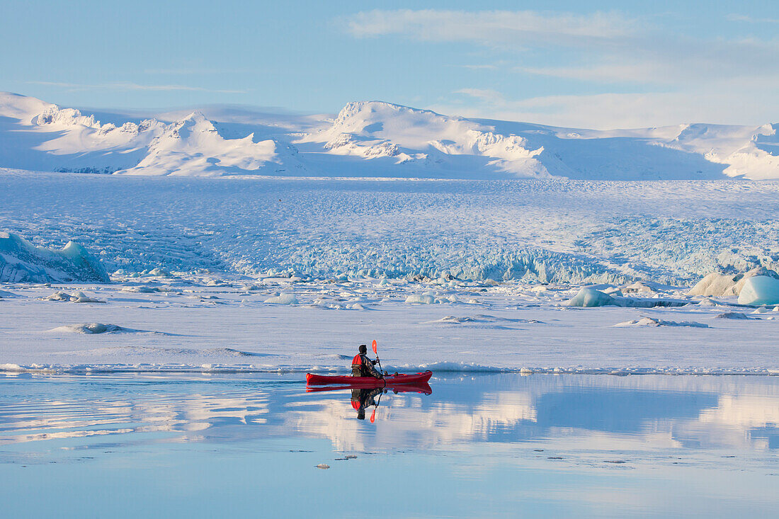  Kayaking in glacier lake Joekusarlon, winter, Iceland 