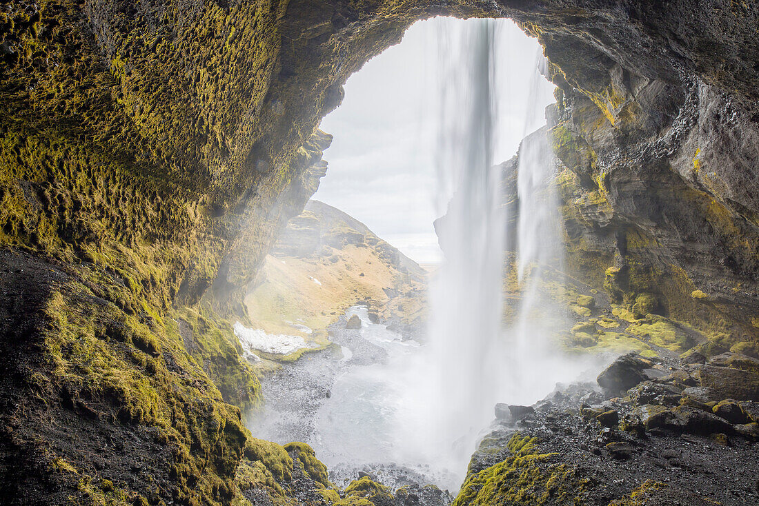  View from behind the Kvernufoss waterfall, winter, Iceland 