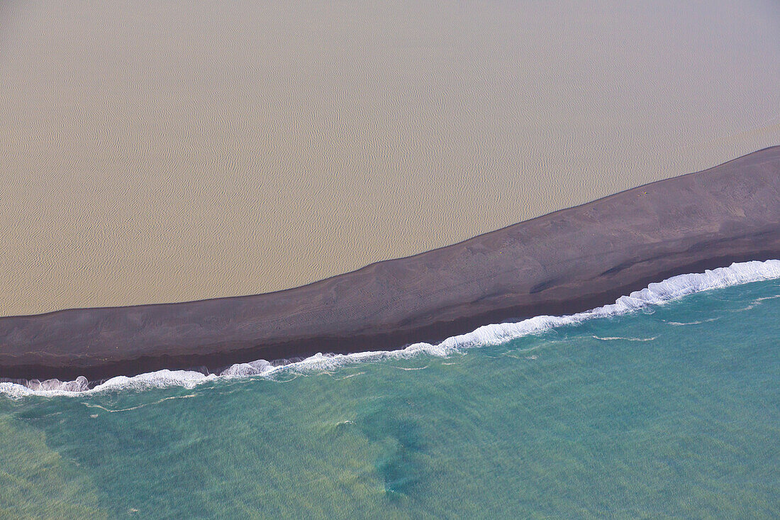  Sediments in the water at the lava sand beach Landeyjarsandur, aerial photo, summer, Iceland 