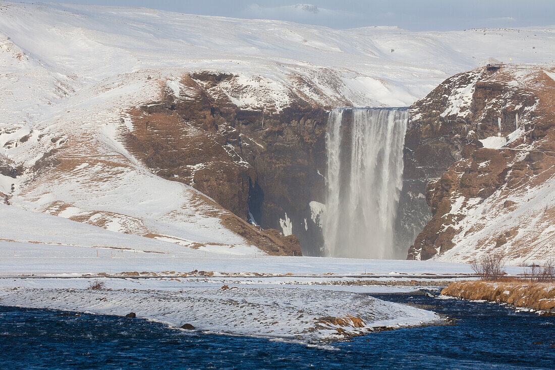  Skogafoss, 63m high waterfall, winter, Iceland 