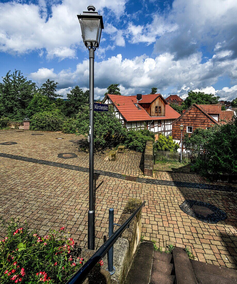  Fairytale district Niederzwehren, fairytale square, in the background bust of Dorothea Viehmann, view of the fairytale district, Kassel, Hesse, Germany 