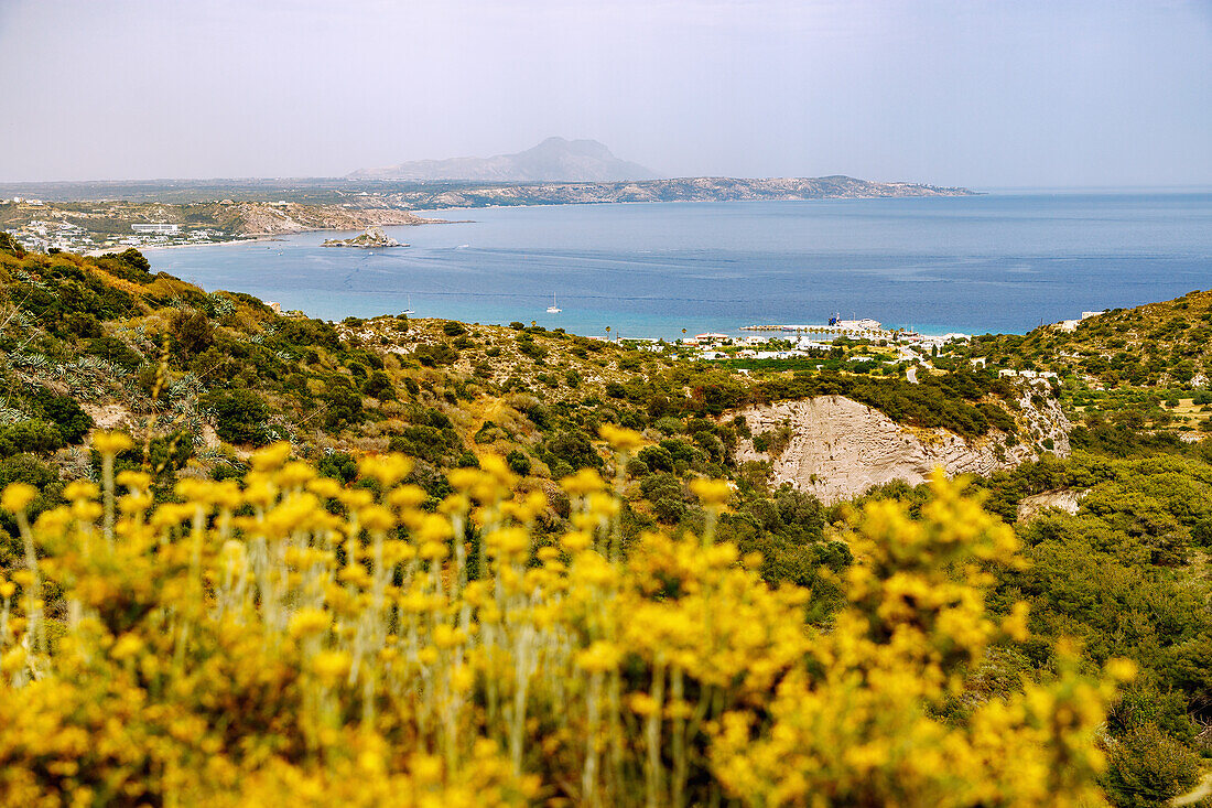  Bay of Kefalos (Kolpos Kefalou) overlooking Kamari and Kambos with the island of Nisi Kastri on the island of Kos in Greece 