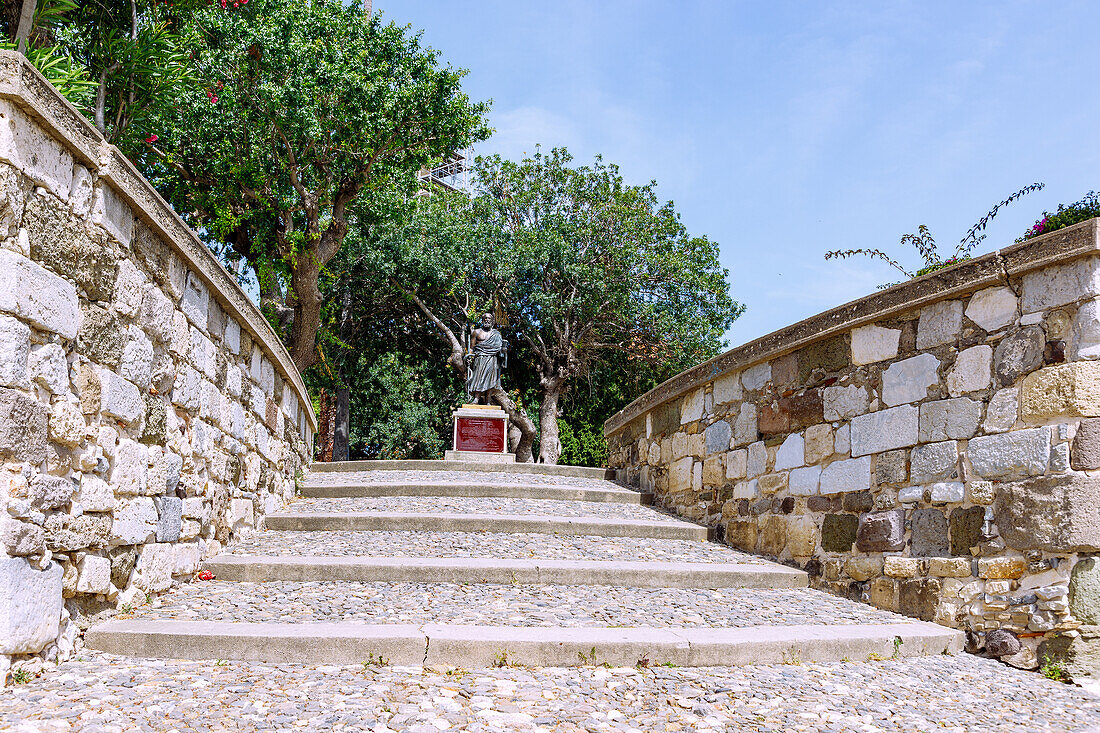  Bronze statue of Hippocrates at the entrance to the plane tree of Hippocrates in Kos Town on the island of Kos in Greece 