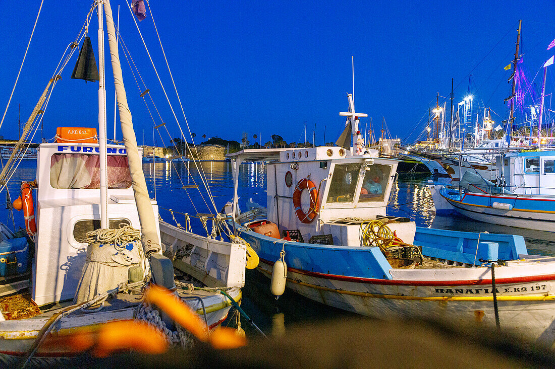  Harbour with Knights Castle Neratzia and fishing boats in Kos Town on the island of Kos in Greece 