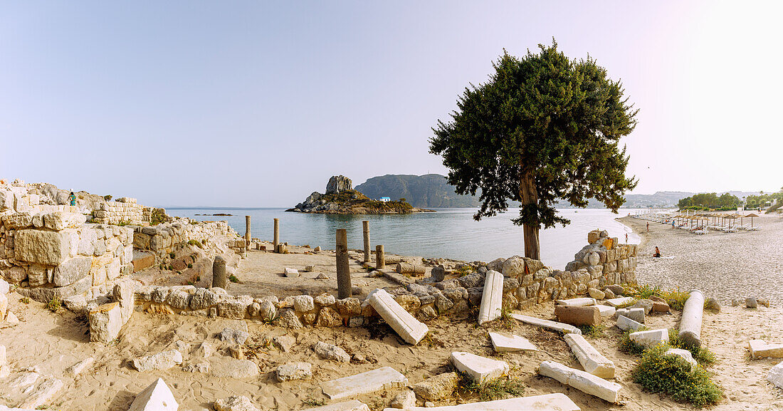  Early Christian basilica of Agios Stefanos with a view of the island of Kastri with the chapel of Agios Nikolaos, the bay of Kefalos and Agios Stefanos Beach on the island of Kos in Greece 