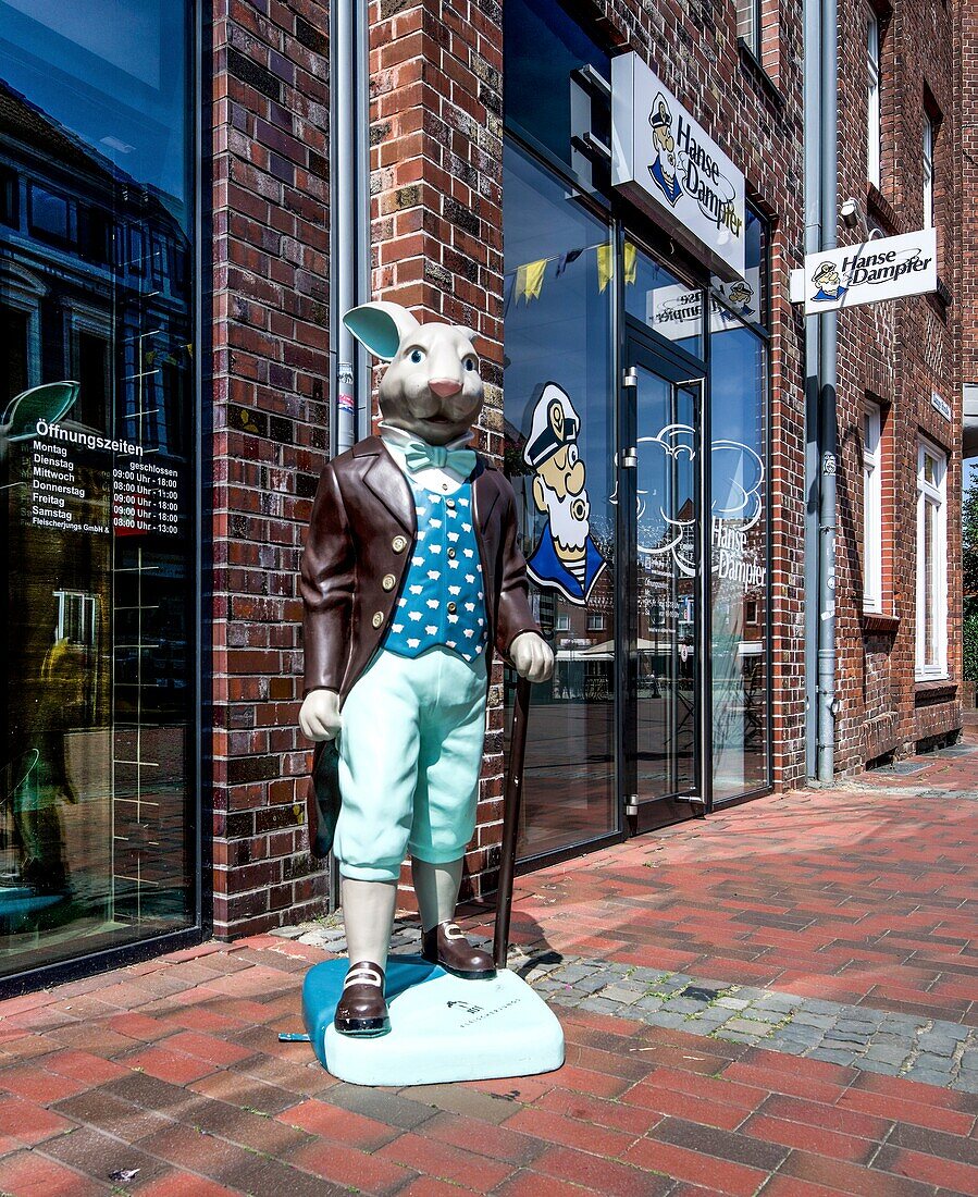  Figure of the rabbit in the old town of Buxtehude, Lower Saxony, Germany 