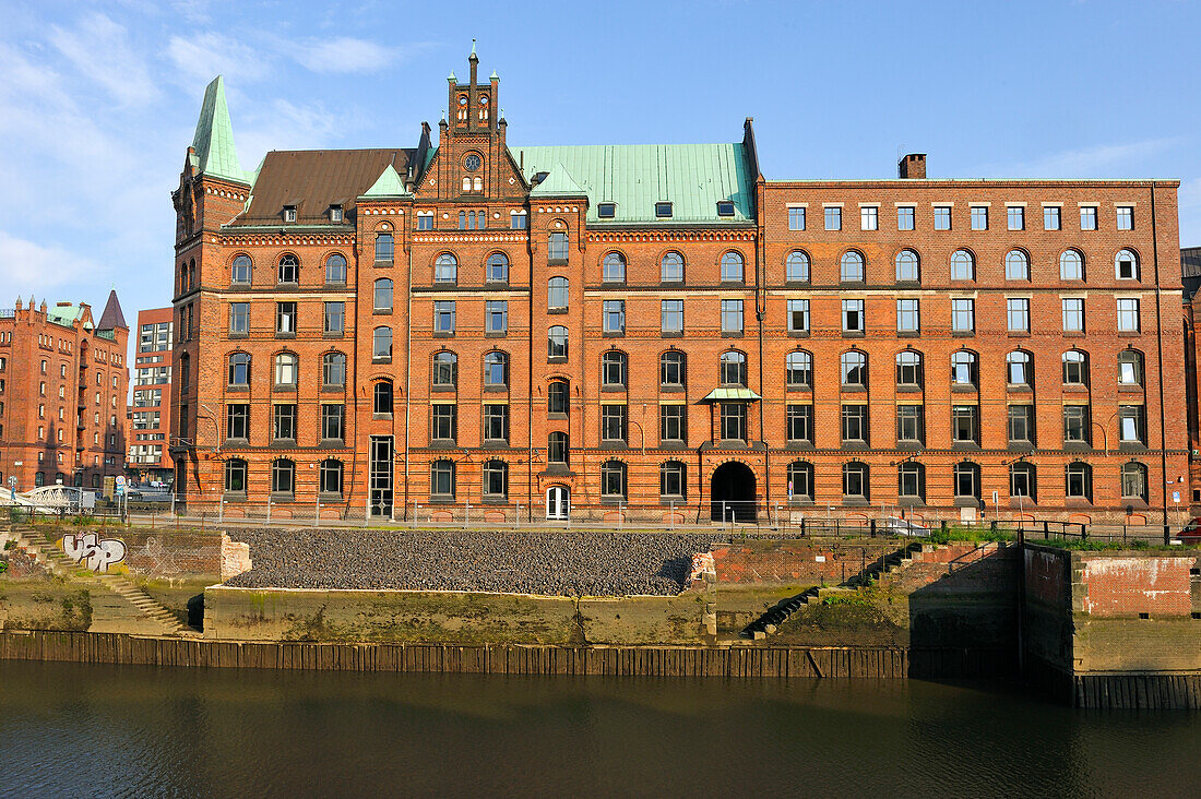 remarkable building of Block P on the edge of Zollkanal in the Speicherstadt (City of Warehouses), HafenCity quarter, Hamburg, Germany, Europe