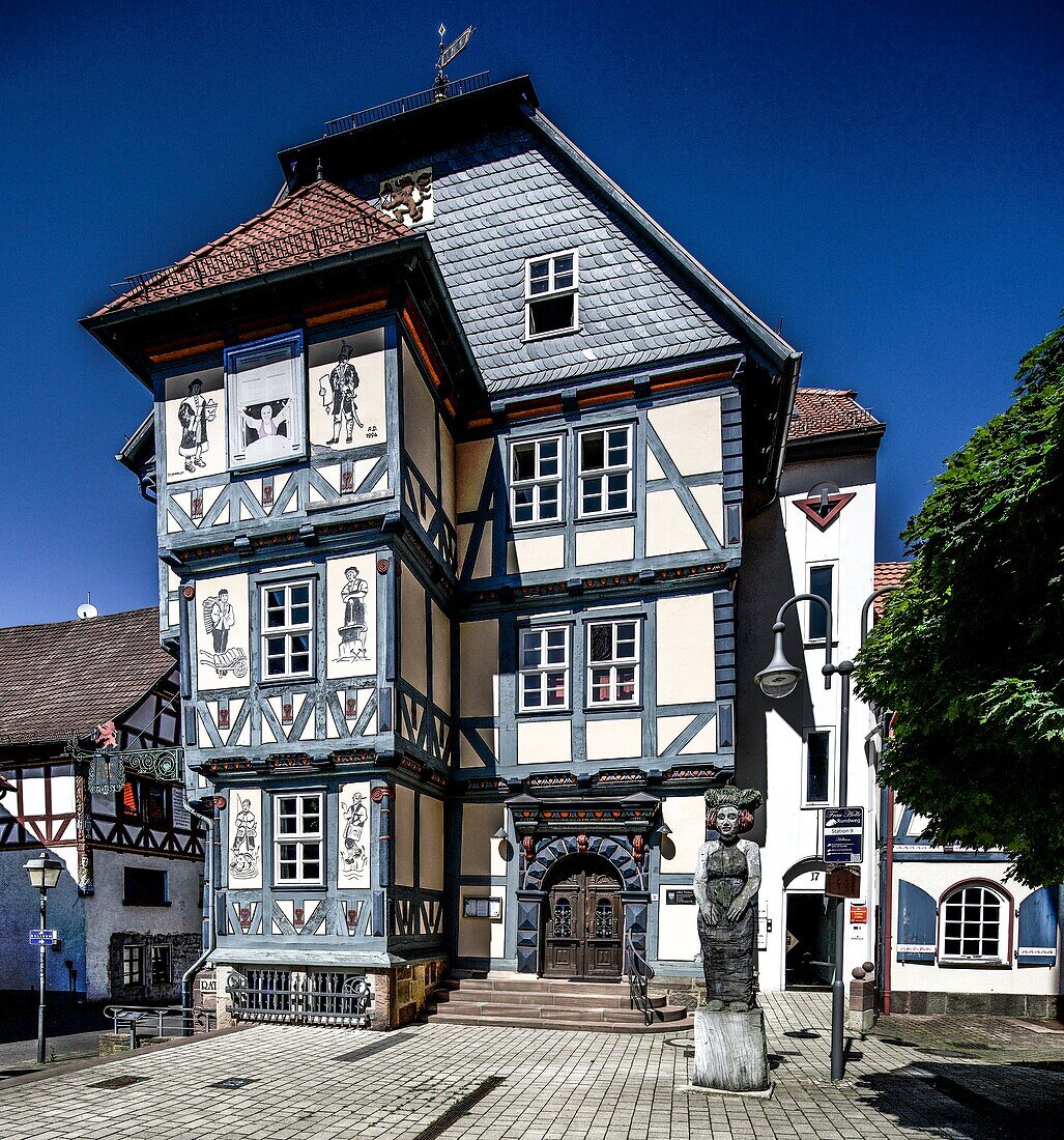  Holleum in the Old Town Hall, statue of Frau Holle, market square in Hessisch Lichtenau, Hesse, Germany 