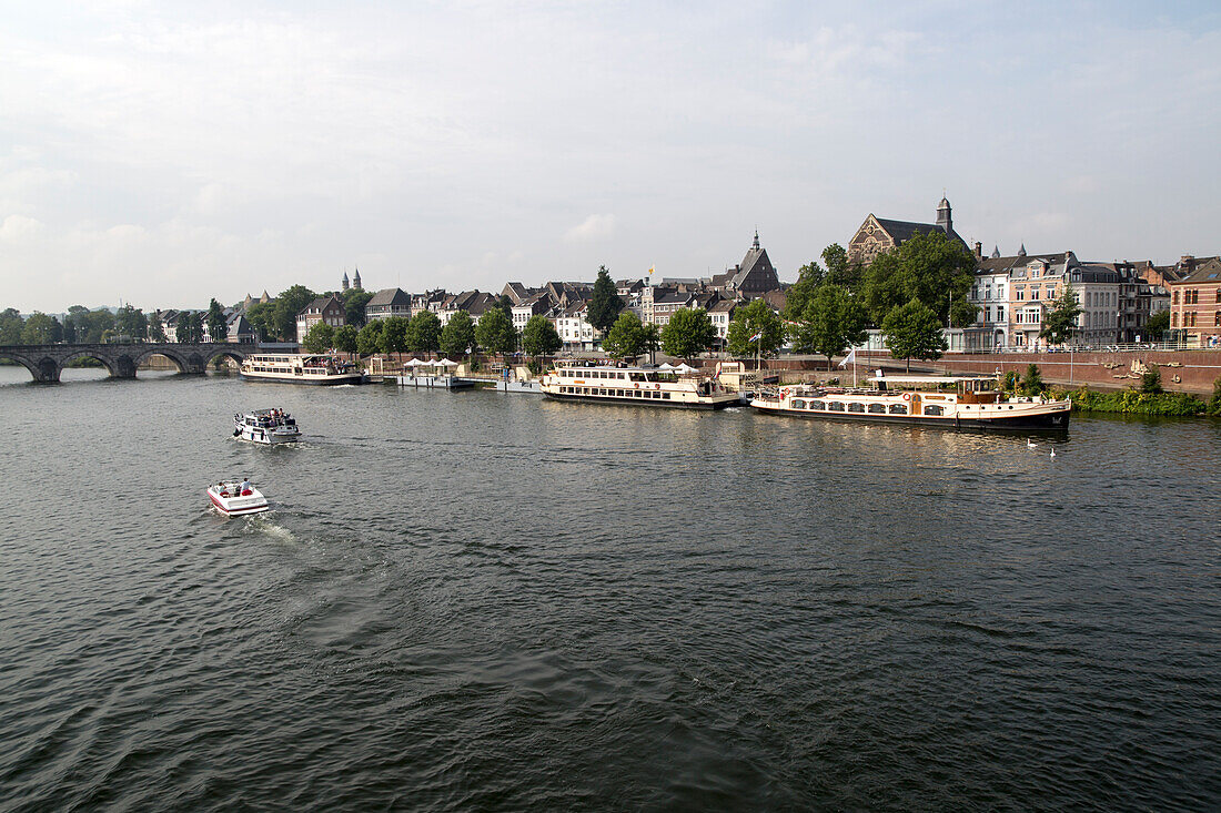 Tourist boats on the river Maas or Meuse, Maastricht, Limburg province, Netherlands