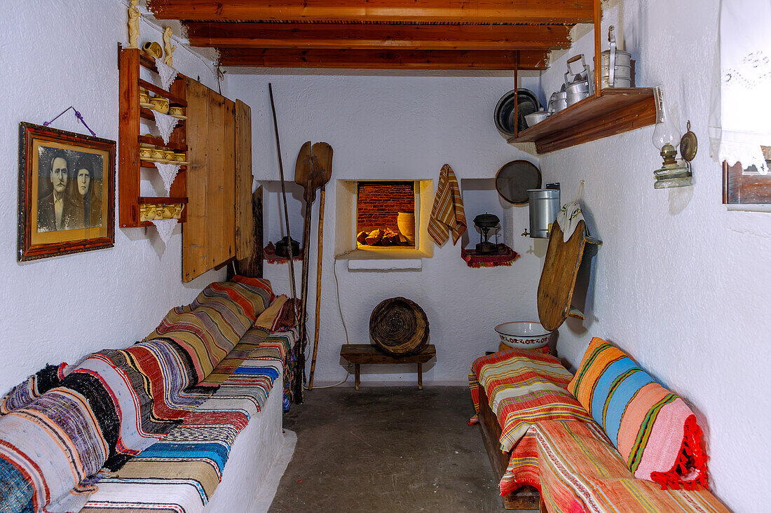  Traditional House of Antimachia on the island of Kos in Greece: Living room with oven and seating 