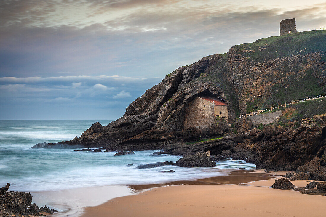  View over the beach to the rock chapel Ermita de Santa Justa. 