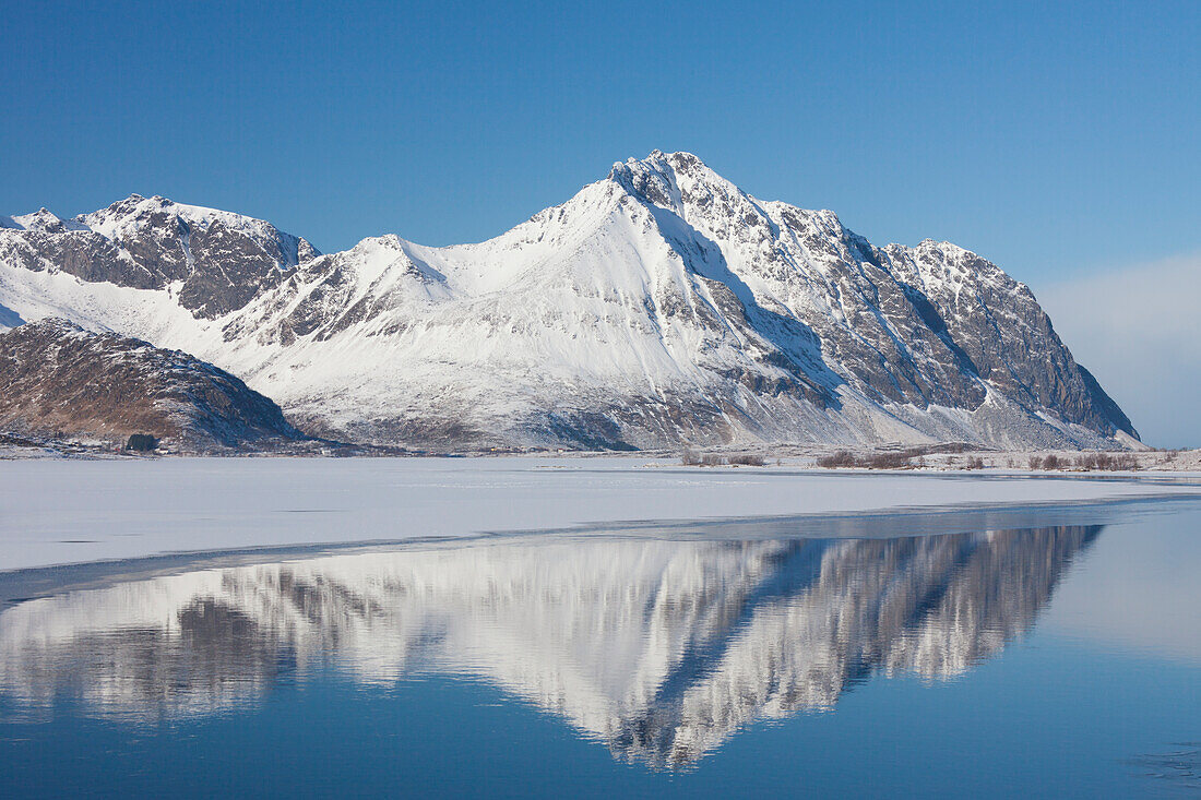  Reflection of snowy mountains, Ytterpollen, winter, Vestvågøya, Lofoten, Norway 