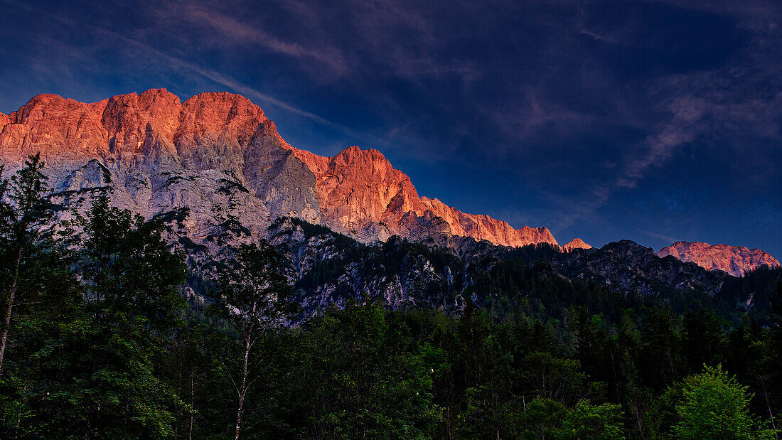  Gesäuse National Park, Styria-Austria. View from the Forstgarten campsite to the Planspitze. Dusk / sunset 