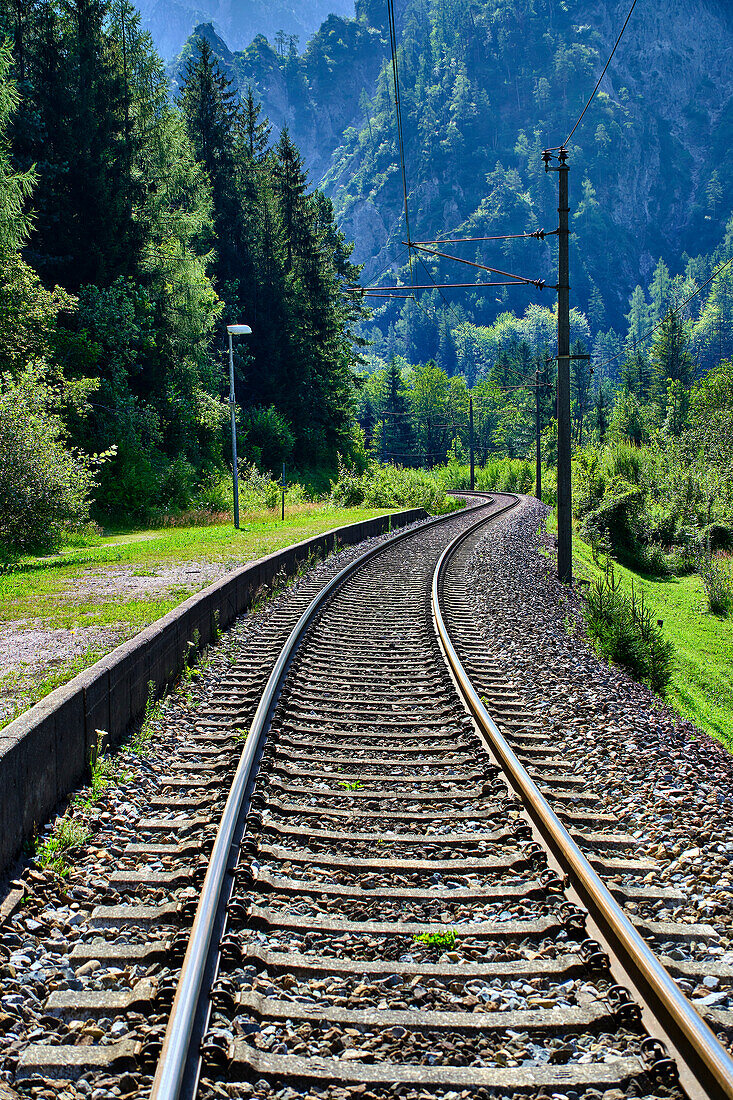  Gesäuse National Park, Styria-Austria. Railway line on the river Enns 