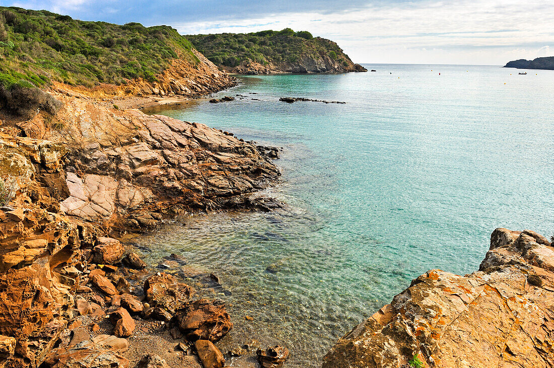 rocky inlet in front of the village of Es Grau, s'Albufera des Grau Natural Park, Menorca, Balearic Islands, Spain, Europe