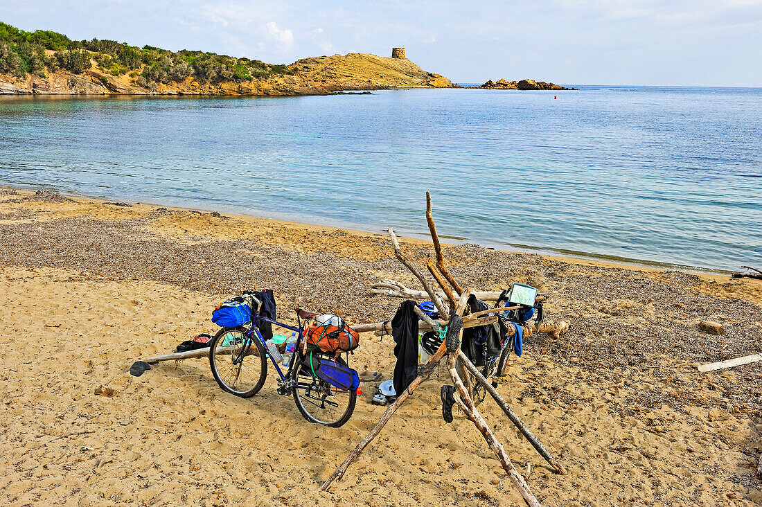 Tamarells beach  with, in the background, the headland and watchtower Es Colomar, s'Albufera des Grau Natural Park, Menorca, Balearic Islands, Spain, Europe