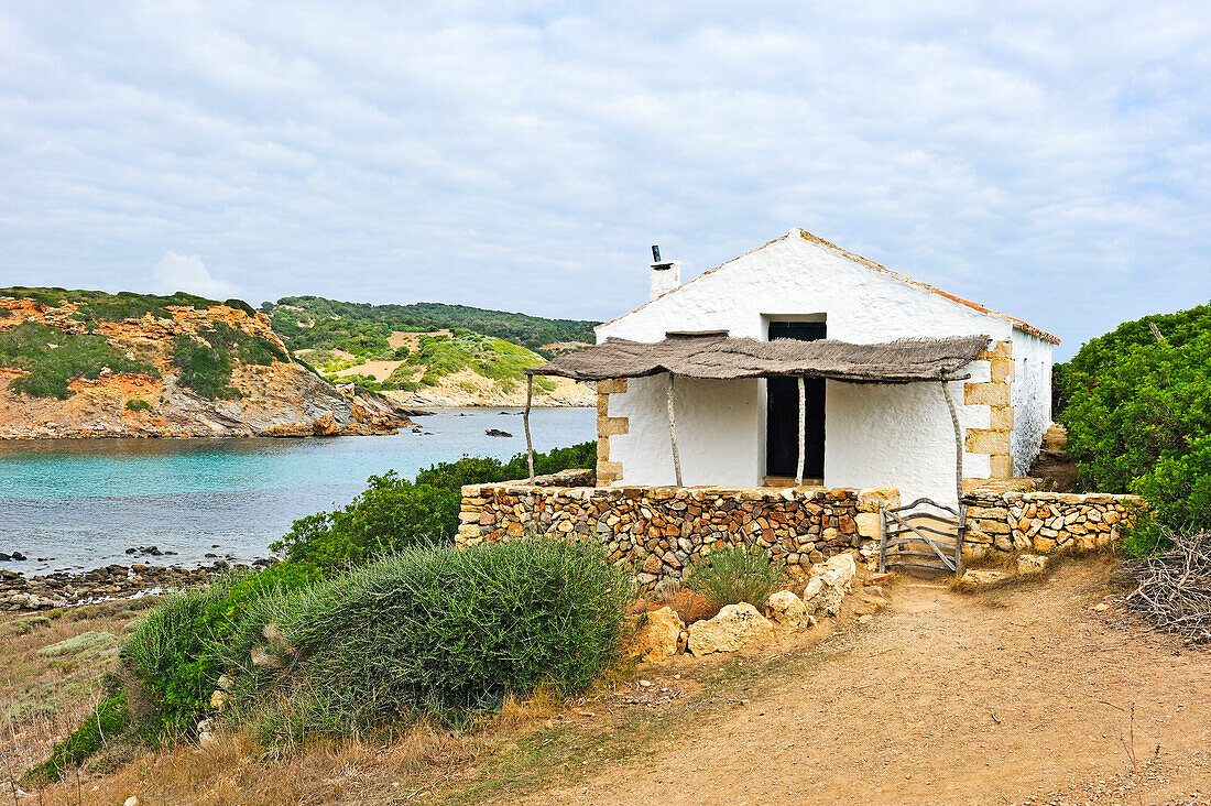 shelter house on the edge of the Cami de Cavalls (hiking trail GR 223) beside the Cala Rambles, s'Albufera des Grau Natural Park, Menorca, Balearic Islands, Spain, Europe