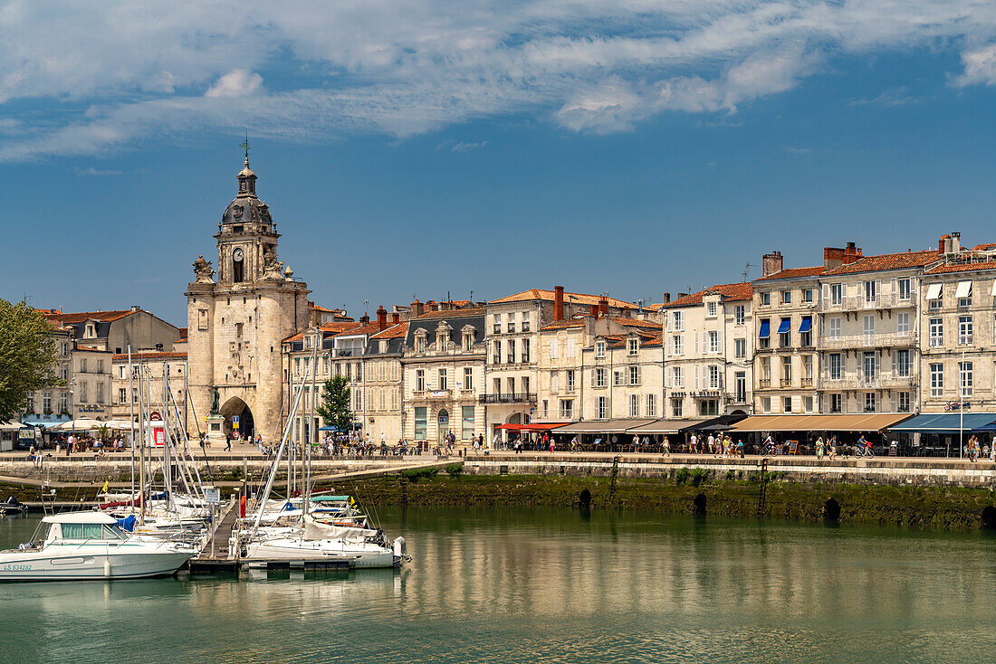  Harbor, clock tower Porte de la Grosse Horloge and the old town in La Rochelle, France, Europe 