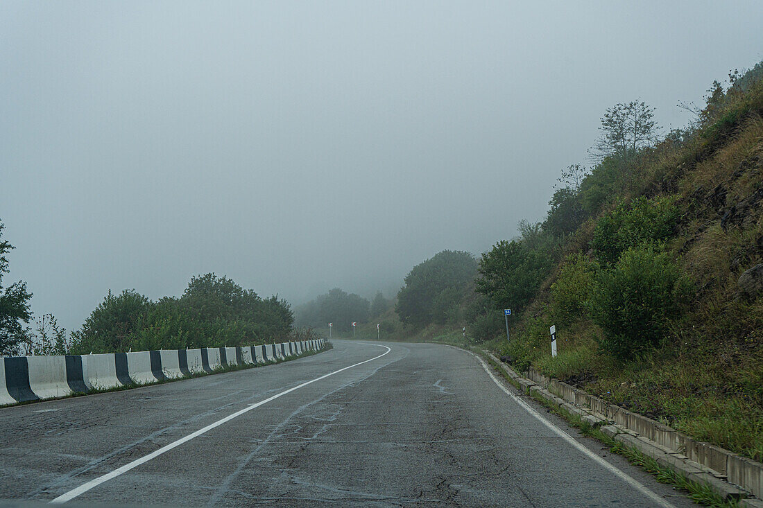 Rural road in the countryside of Georgia in summer season