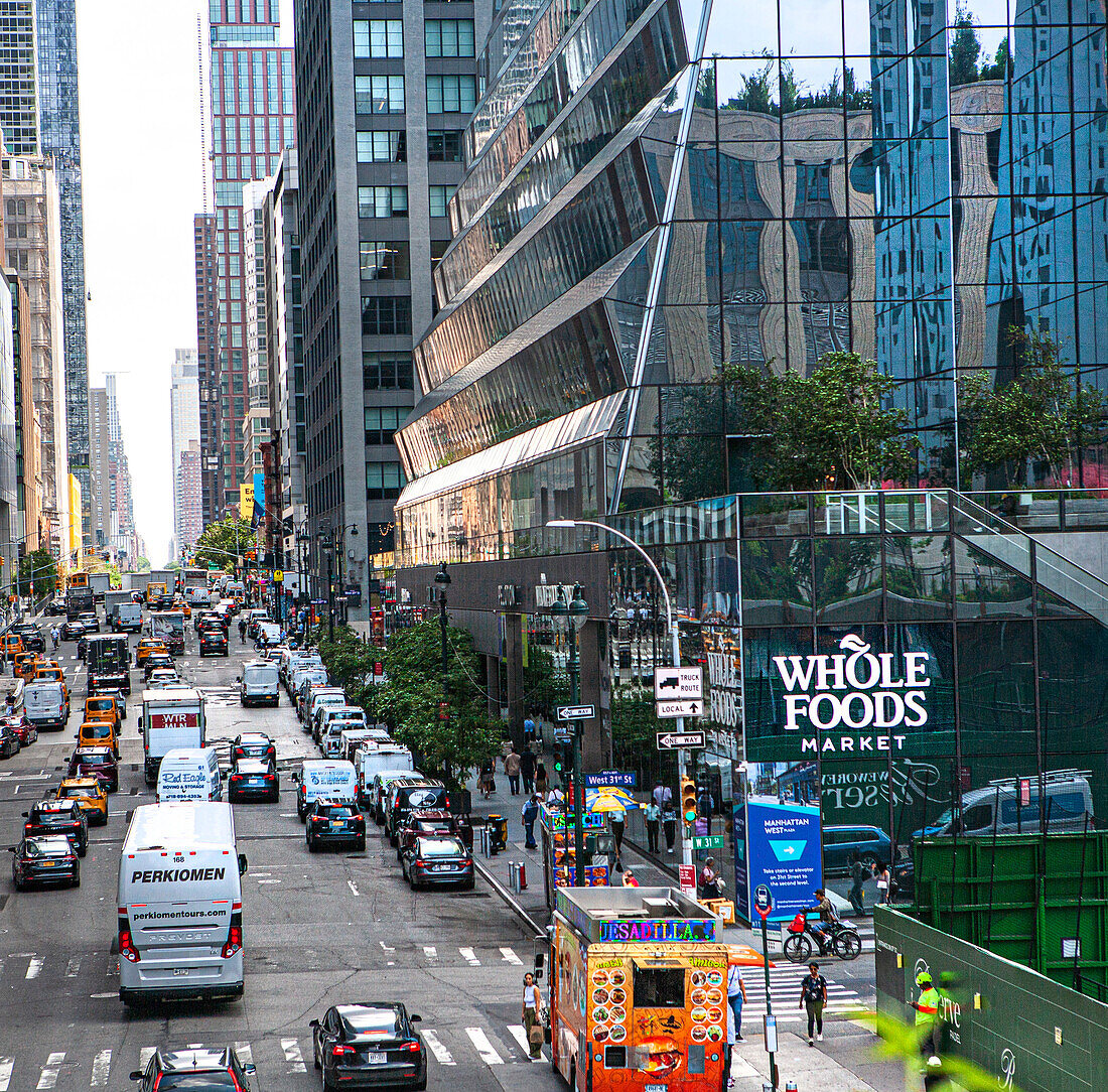 Street scene, Tenth Avenue at 31st Street looking north, New York City, New York, USA