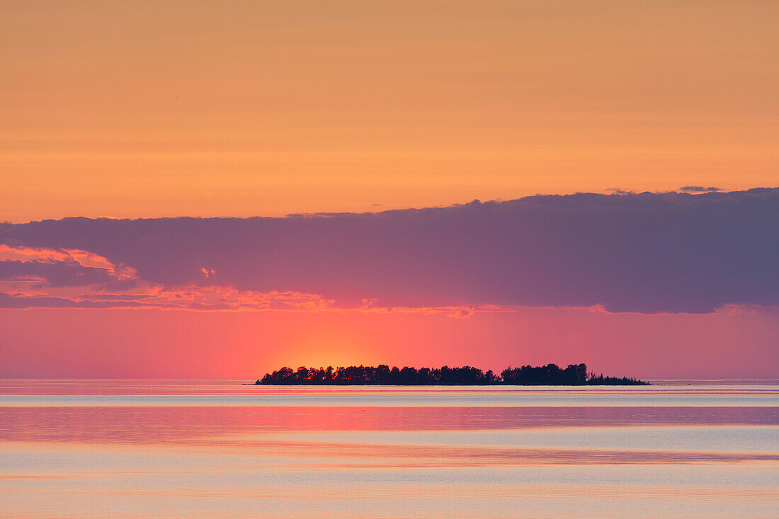  Island in Lake Vaenern at sunset, Vaermland, Sweden 