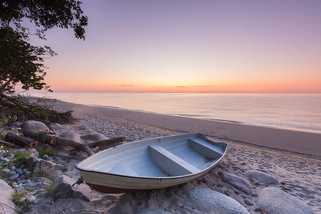  Rowing boat on the beach of Knaebaeckshusen, Skåne County, Sweden 