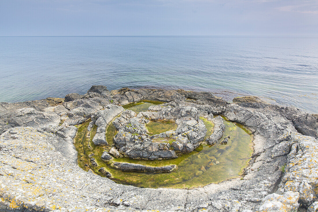  The fossil sand volcano Praestens badkar on the Baltic coast near Vik, Skane, Sweden 