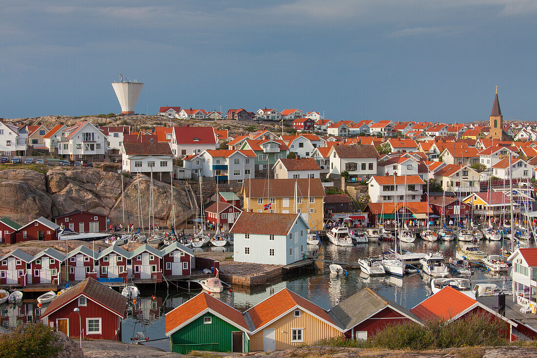  Colorful boathouses in Smoegen, archipelago, Bohuslaen, Sweden 