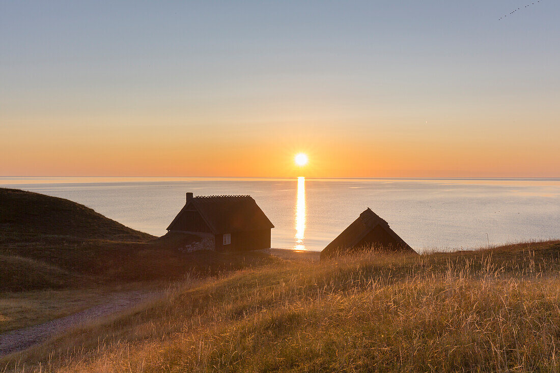  Fisherman&#39;s hut on the coast at sunrise, Havaeng, Skåne County, Sweden 