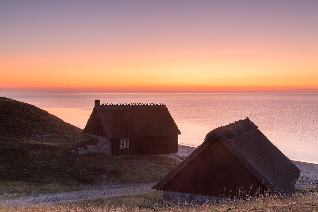  Fisherman&#39;s hut on the coast at sunrise, Havaeng, Skåne County, Sweden 