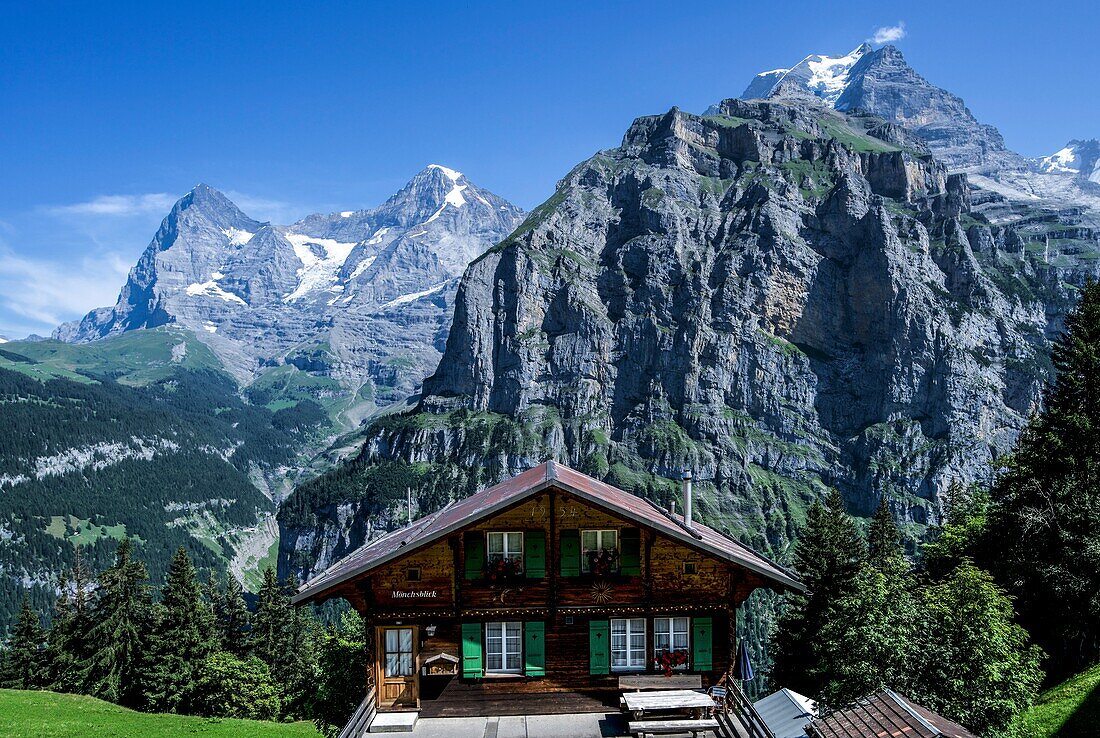  Alpenhaus in Mürren, Eiger, Mönch and Jungfrau in the background, Mürren, Bernese Oberland, Switzerland 