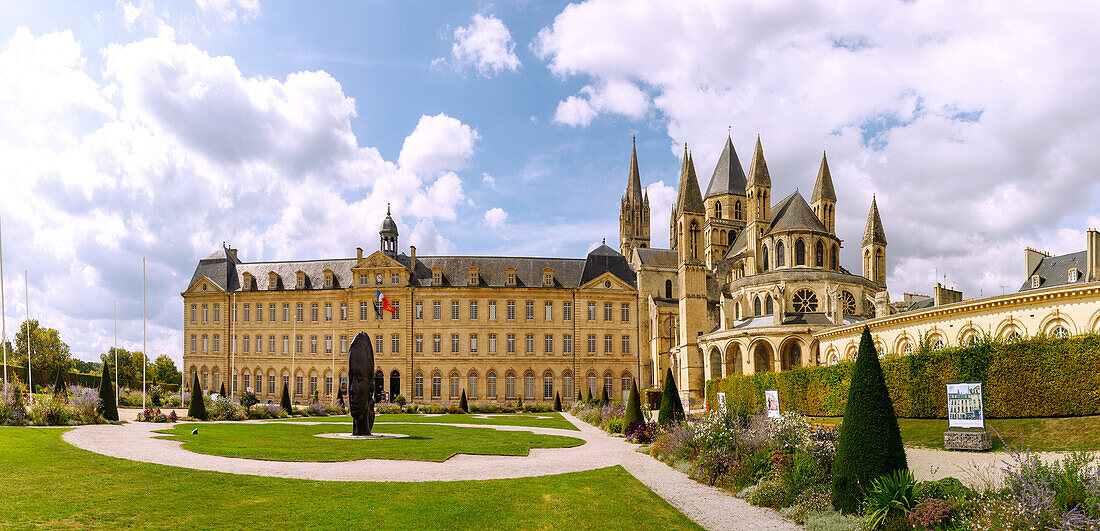  Abbaye aux Hommes (Men&#39;s Abbey, Hôtel de Ville, Town Hall) and Church of Saint-Ètienne (Saint-Etienne) with garden and sculpture &quot;Lou&quot; by Jaume Plensa (2015) in Caen in the Calvados department in the Normandy region of France 