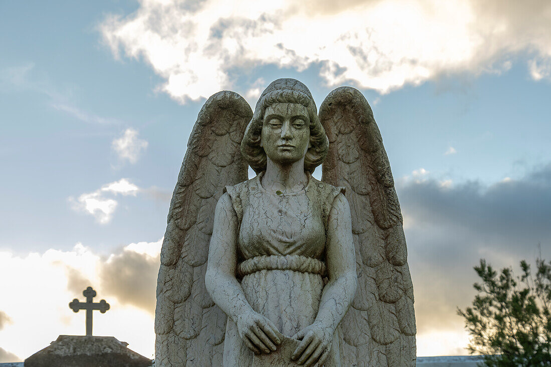 Old grave at the cemetery of the hurch of Senhor Santo Cristo dos Milagres in Fazenda, Flores, Azores islands, Portugal.