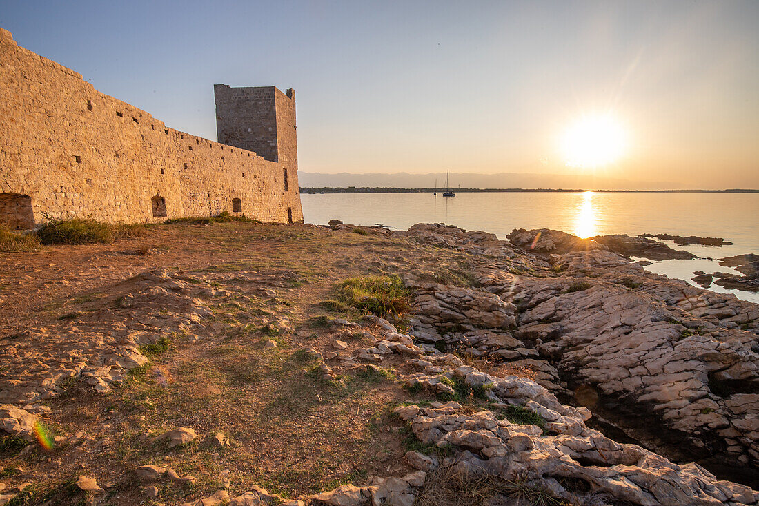  Kastelina Castle, Mediterranean bay with calm water at sunrise, Mediterranean landscape of Vir island, Zadar, Dalmatia, Croatia, Adriatic Sea 