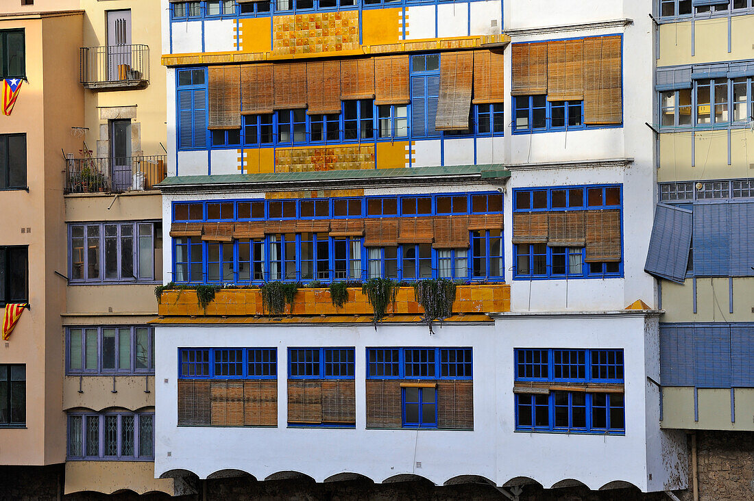 front of the white Casa Maso, birthplace of the Catalan architect Rafael Masó (1880-1935), by the Onyar River, Girona, Catalonia, Spain,Europe