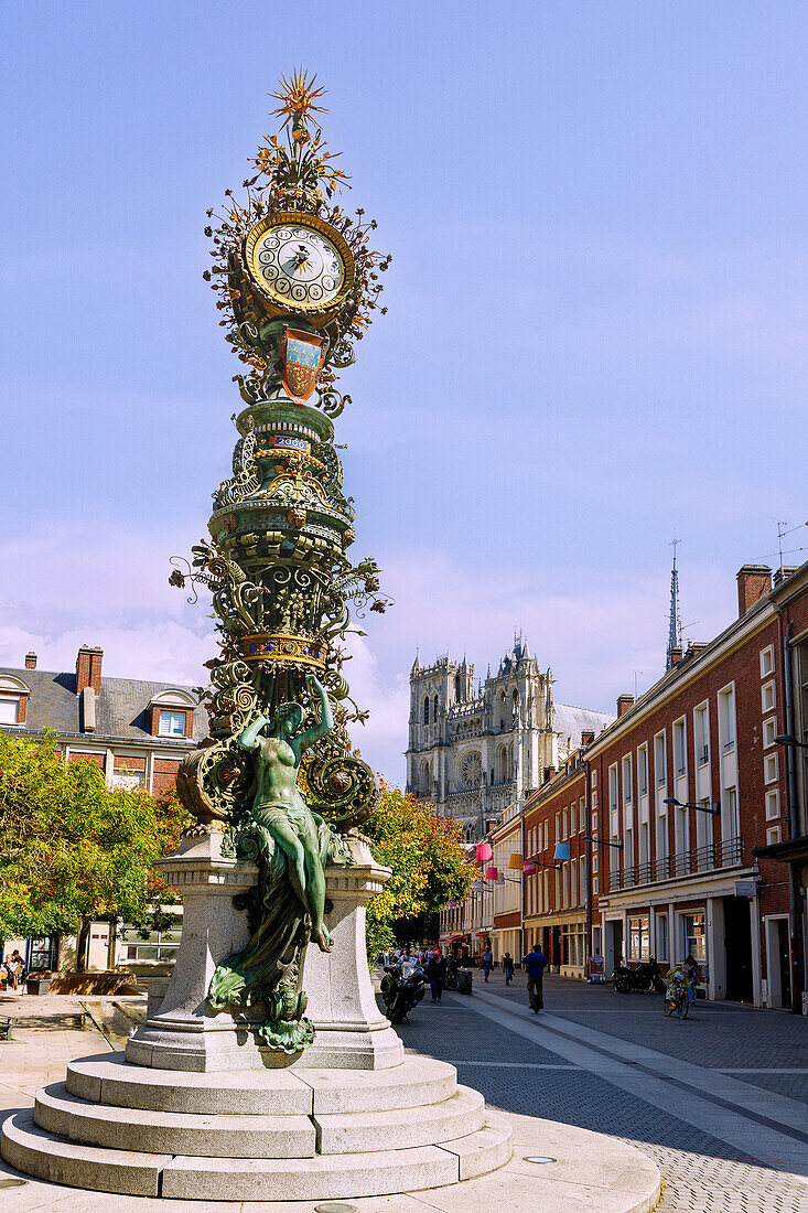  Clock Horloge Dewailly et Marie-sans-chemise on Rue des Sergents with a view of the Notre-Dame Cathedral in Amiens in the Somme department in the Hauts-de-France region of France 